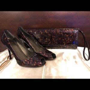 Stuart Weitzman Tortoise clutch. Very clean.
